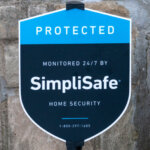simplisafe sign with text reading home security